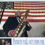 Dick Saunders playing saxophone news article